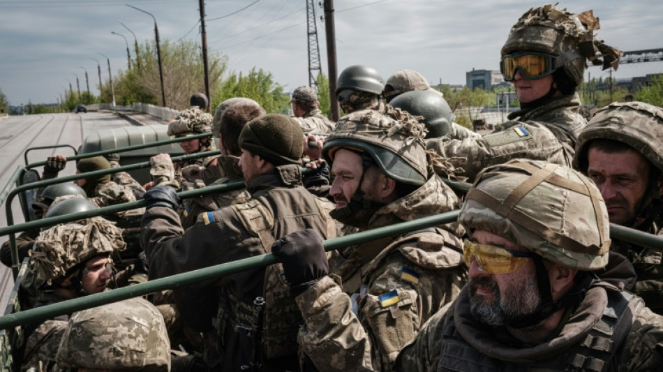 Exhausted Ukrainian soldiers return from eastern front