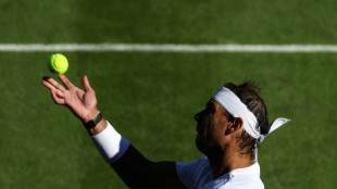 Nadal and Swiatek survive wobbles to progress at Wimbledon