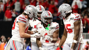 Ohio State holds off Notre Dame to clinch US college football crown