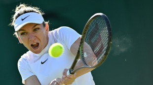 Former Wimbledon champ Halep advances to third round