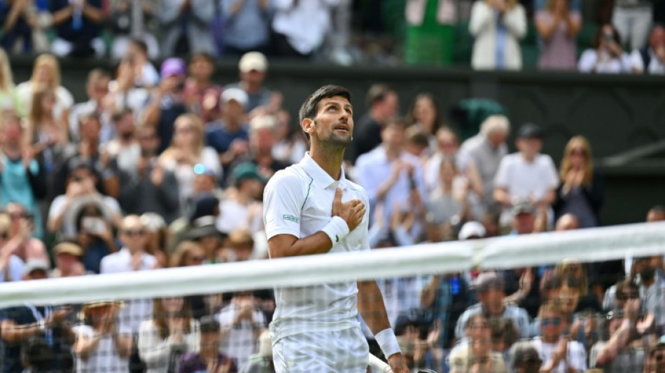 Jailed Becker's girlfriend, son watch Djokovic at Wimbledon 