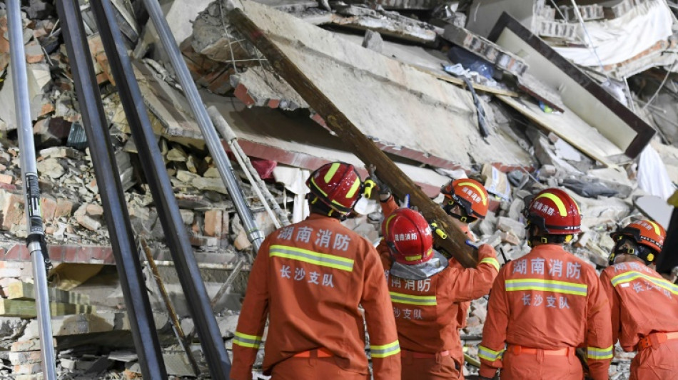 Hopes dim for finding China building collapse survivors