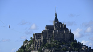 Frenchman beats high-wire record at Mont Saint-Michel