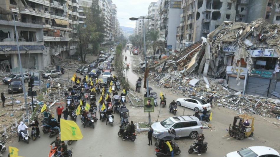 Bewohner in Beiruts Hisbollah-Hochburgen feiern Waffenruhe als "Sieg"