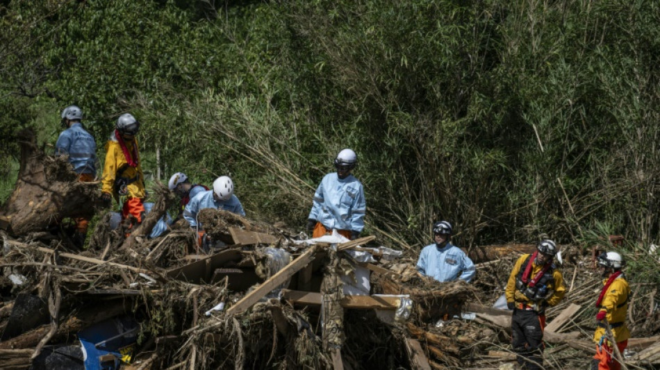 Rescuers comb muddy riverbanks after Japan floods kill six