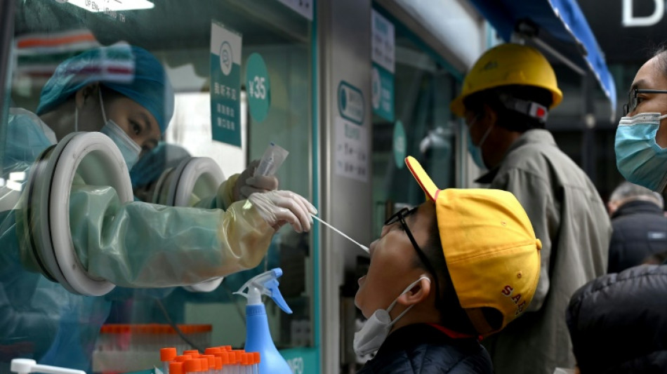 As virus cases surge, can China's zero-Covid strategy hold?