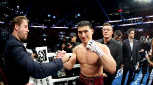 Bivol beats 'Canelo' Alvarez to retain WBA light heavyweight title 