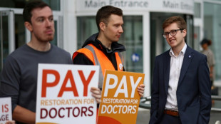 Doctors in England step up strike action over pay 