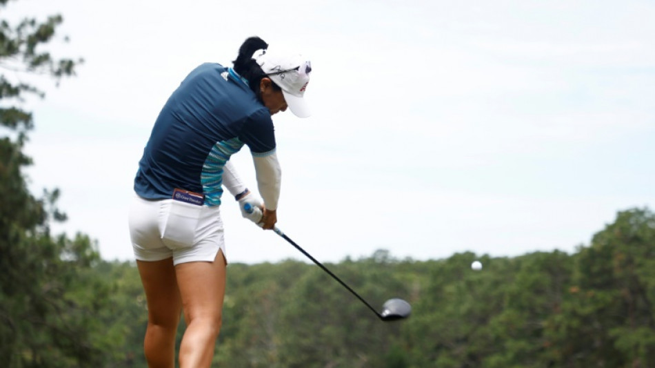 Kang playing with spinal tumor at US Women's Open