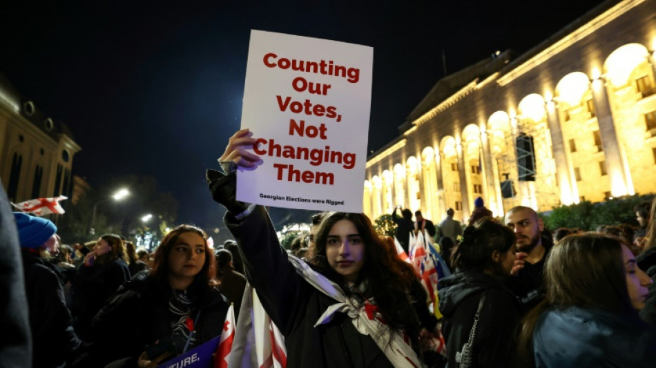 Tens of thousands rally in Georgia after contested vote 