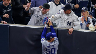 Yankee fans who interfered with Betts grab barred for game five