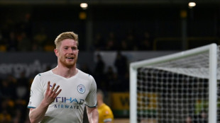 Four-goal De Bruyne edges Man City closer to Premier League title