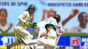 Lyon bags five as Australia bowl out Sri Lanka for 212 in 1st Test