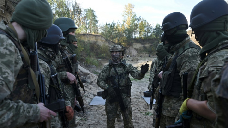 Cansados de protestar, los opositores rusos de Putin toman las armas en Ucrania