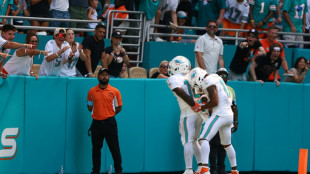 Hill sparks Dolphins comeback, Cowboys rout Browns in NFL