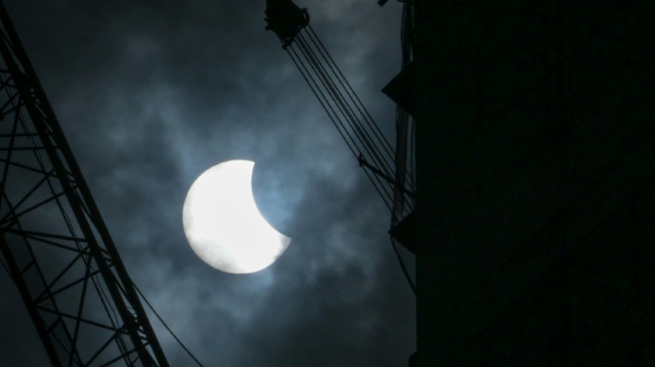 Stargazers witness dazzling solar eclipse in Australia